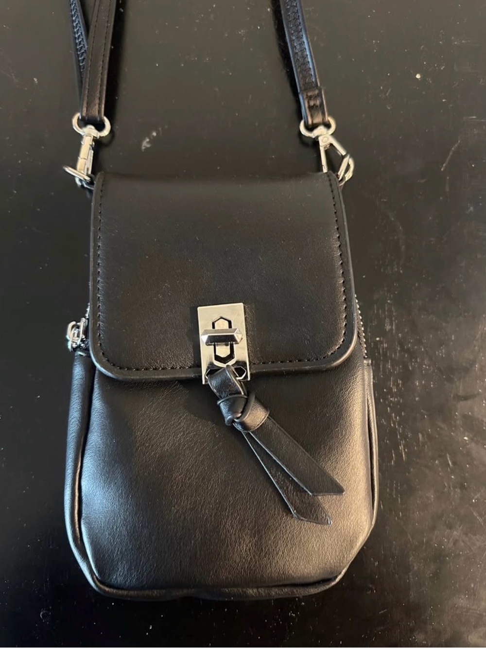 Black Leather Crossbody Phone Bag with Tassel Accent